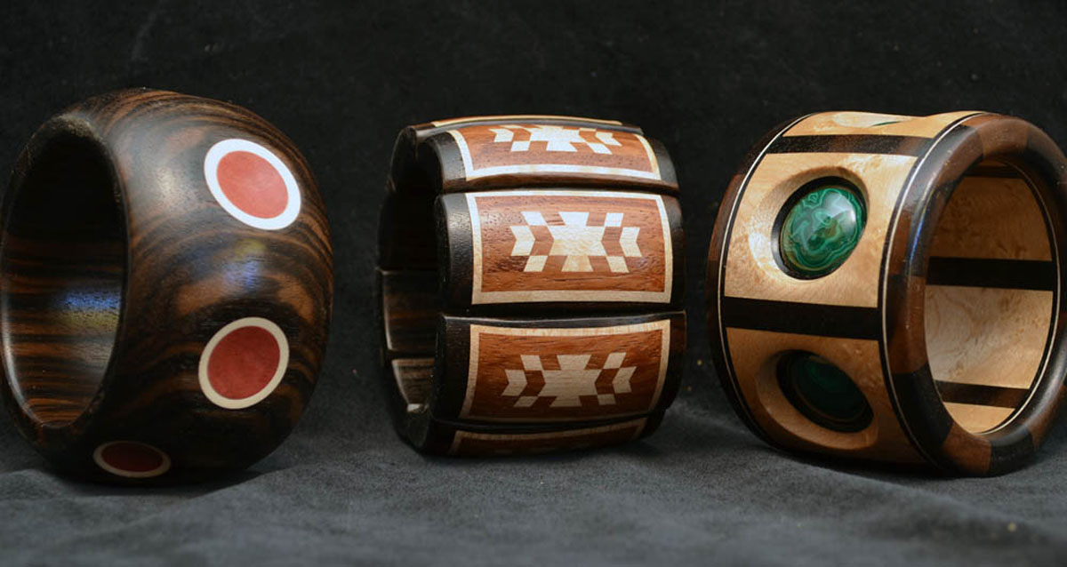 painted wooden bracelets made by segmented wood turning