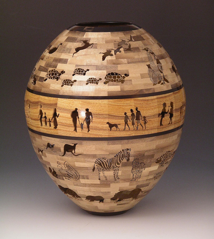 segmented wood turning vase with turtles and zebras