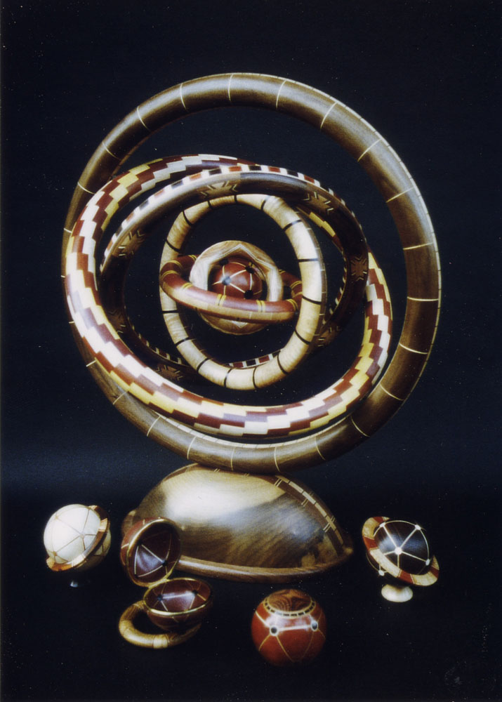 wooden rings stacked inside one another and mounted vertically