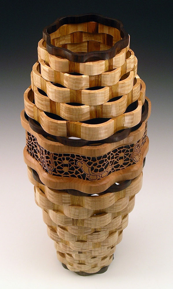 cylinder vase made with segmented wood turning ribbons