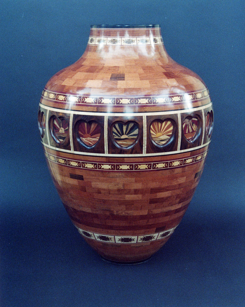 segmented wood turning vase with carved hearts