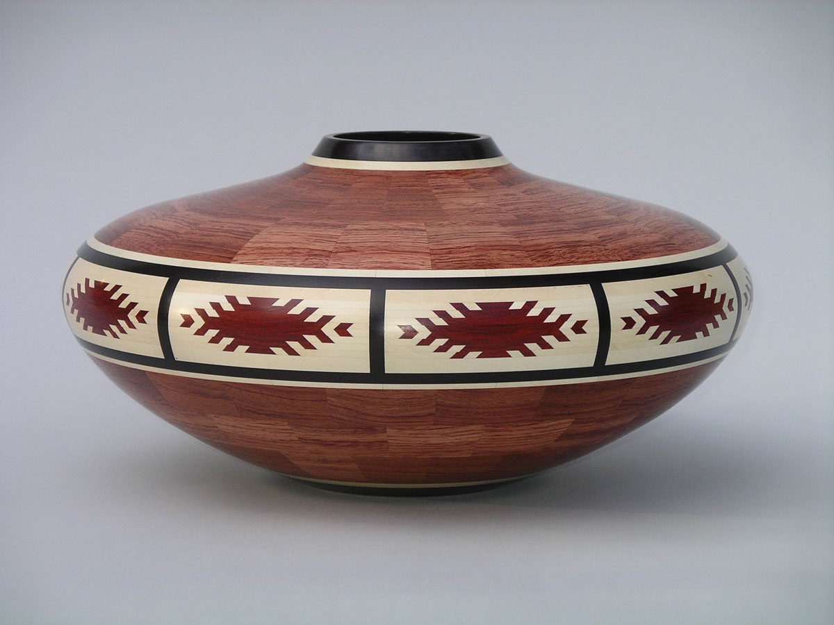 segmented wood turning vase with aztec art inlay