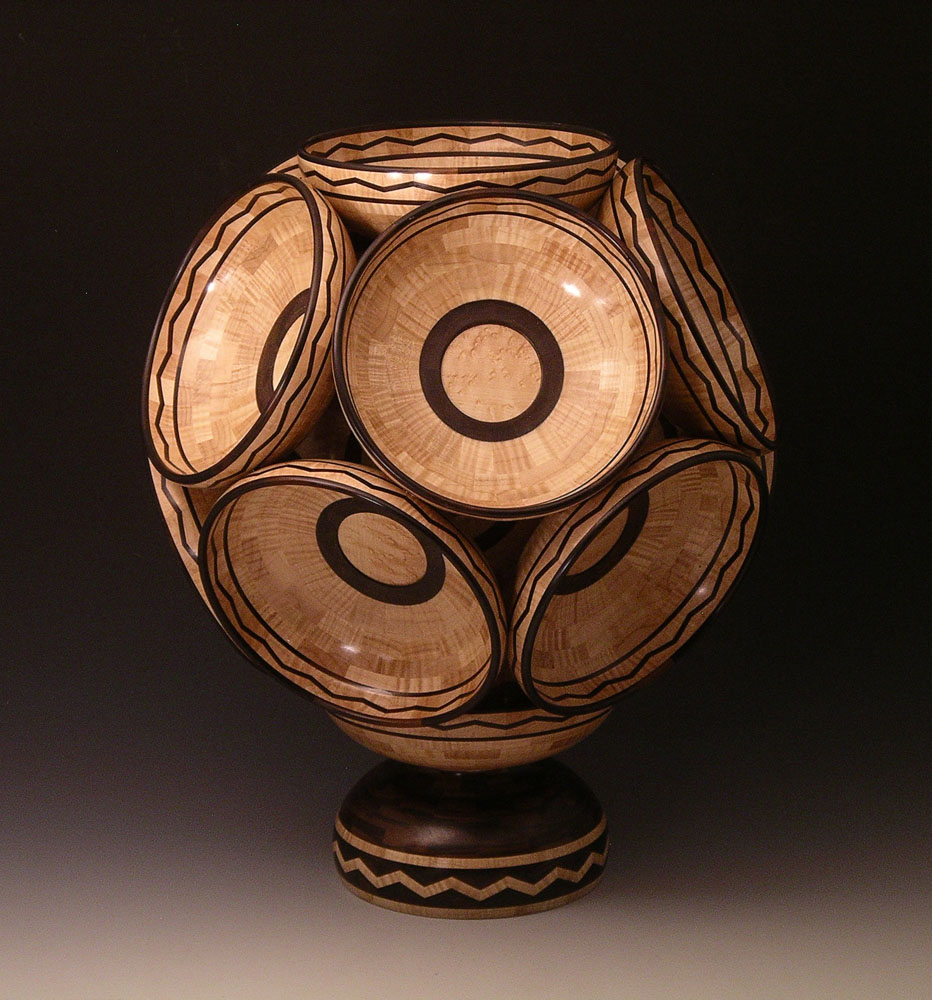 segmented wood turning bowls mounted on a pedestal