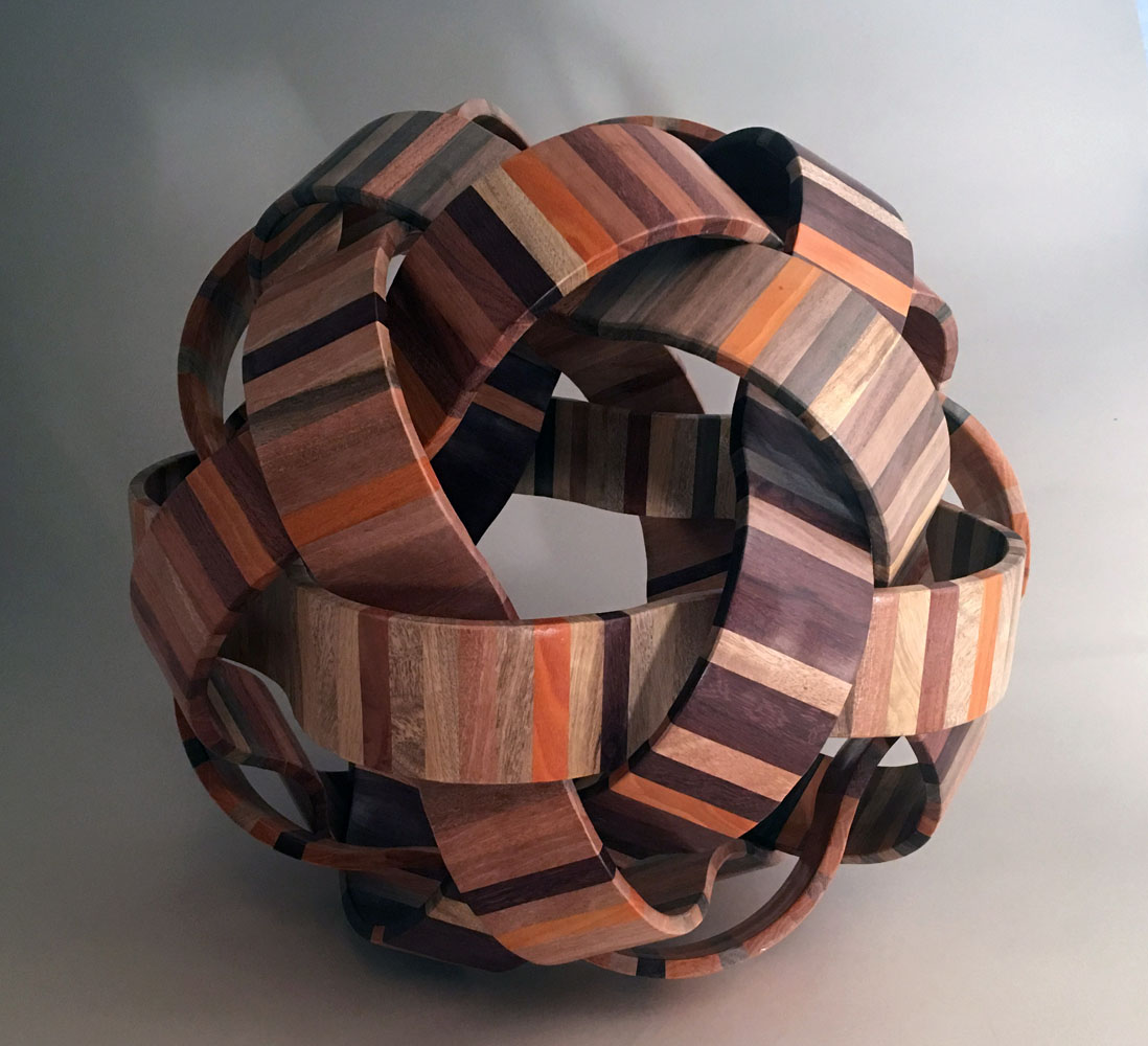 striped wooden ribbons woven into a ball