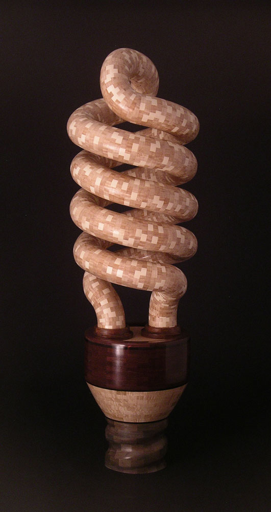 segmented wood turning sculpture of a lightbulb